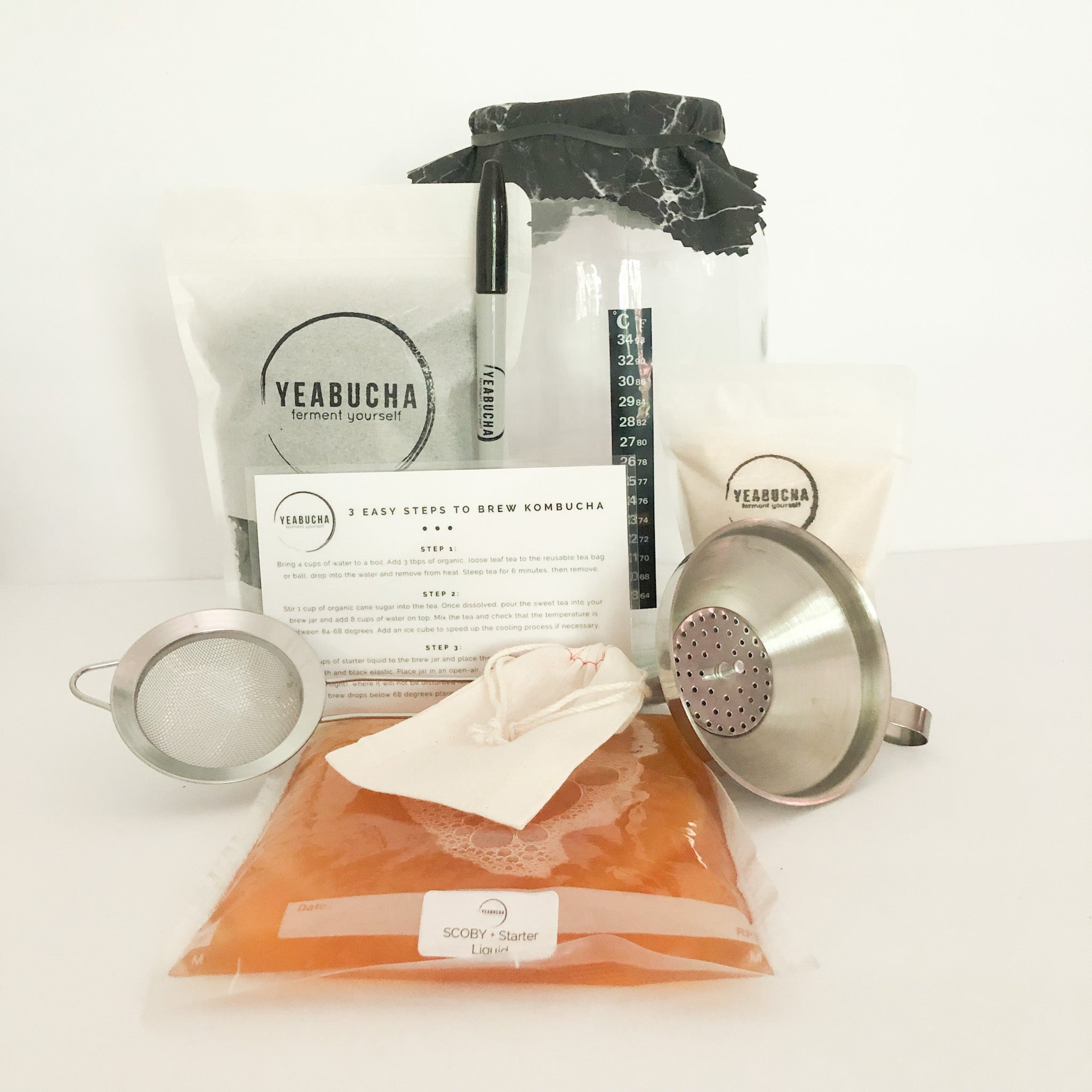 YEABUCHA Essential Home Brew Kombucha Kit. includes: SCOBY, loose leaf Tea, organic sugar, and everything needed to start brewing.